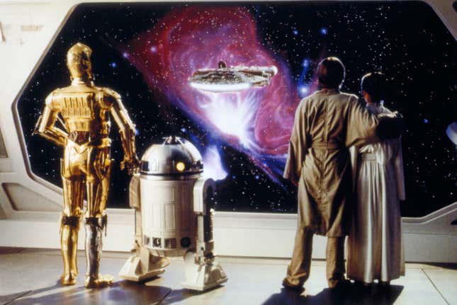 British actors Anthony Daniels, Kenny Baker, American actors Mark Hamill and Carrie Fisher on the set of Star Wars: Episode V - The Empire Strikes Back directed by Irvin Kershner. (Photo by Lucasfilm/Sunset Boulevard/Corbis via Getty Images)