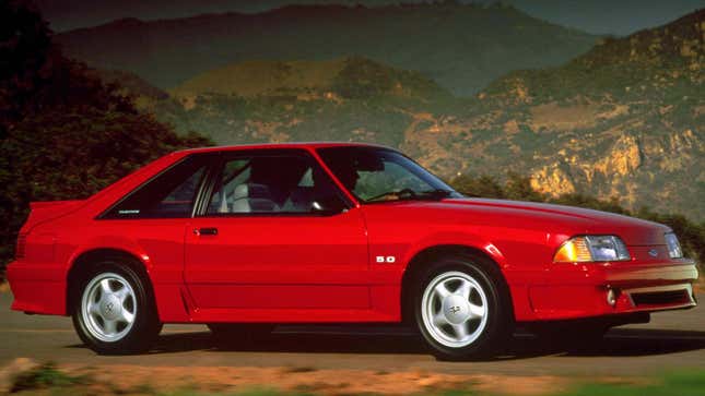 A photo of a red Ford Mustang GT