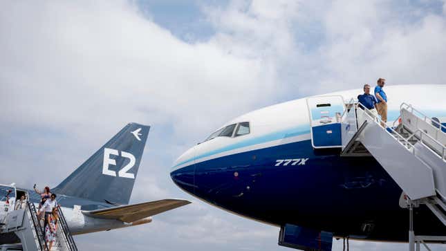 A Boeing plane (right) and an Embraer plane