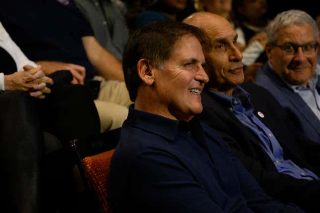 Entrepreneur Mark Cuban listens as Vice President and Democratic presidential nominee Kamala Harris speaks at Carnegie Mellon University in Pittsburgh, Pennsylvania.