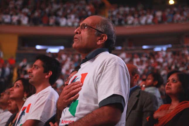 A Modi supporter observes the US national anthem. Nearly all those in attendance were Indian Americans from New York and neighboring states.