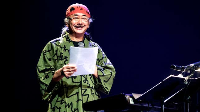 Final Fantasy composer Nobuo Uematsu smiles during a performance at Paris' La Cigale theater in November 2012.