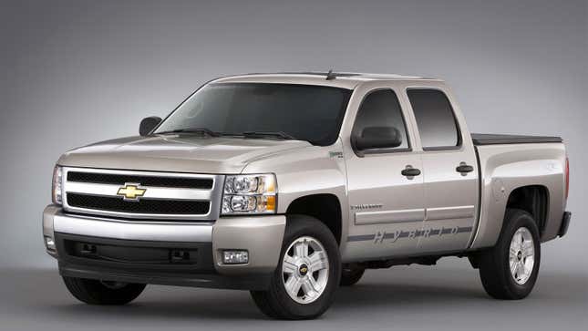 A photo of a silver Chevrolet Silverado pickup truck. 