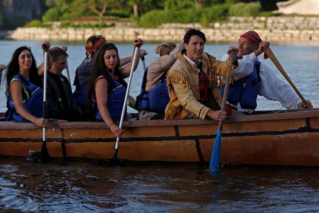 Paddling in an aboriginal canoe, shortly after sunrise, in Ottawa.