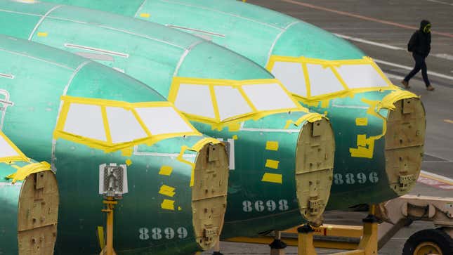 A photo of the front end of 737 aircraft being assembled. 