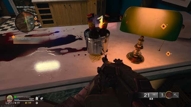 A screenshot showing one of the locations of the sticky notes with the vault combination. This one is hidden under a bucket on a counter in the bowling alley.