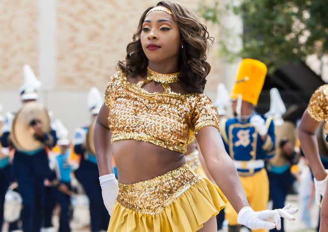 A member of Southern University’s “Fabulous Dancing Dolls” marches out of the stadium after a game at Amon G. Carter Stadium in Ft. Worth, TX.