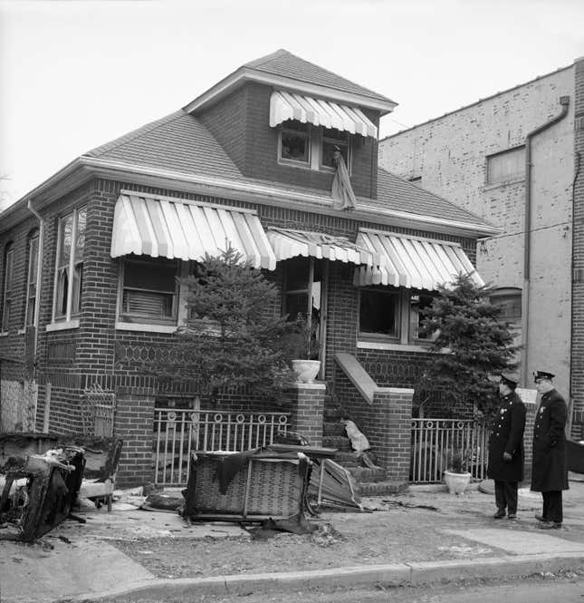 Home of Black Muslim leader Malcolm X is damaged after two fire bombs sparked a flash fire, Feb. 14, 1965 in New York City. Firemen quickly put out the flames. The Nation of Islam leader, his wife Betty, and their four daughters were in the house at the time but escaped unharmed.