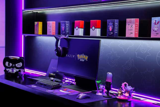 The full Gengar Razer accessory set on a desk, next to other Razer and Pokemon products.