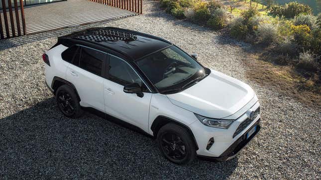 A photo of a white Toyota Rav4 SUV. 