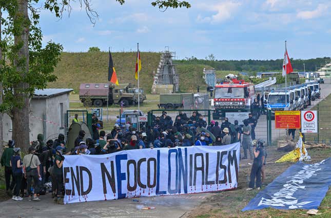 Activists block an access road to Neuhardenberg airfield on May 10, 2024. 