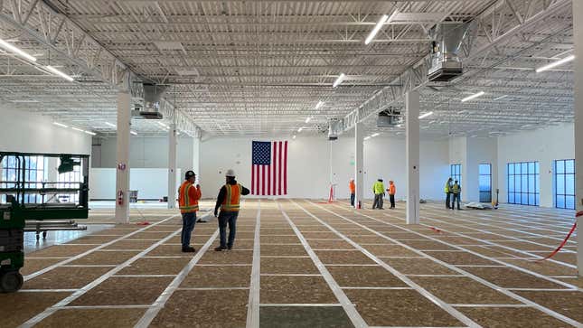 Workers prepare True Anomaly’s hardware and software test facility in March 2023. 