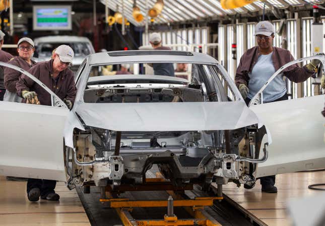 FILE - In this Aug. 31, 2017, file photo, workers produce vehicles at Volkswagen&#39;s U.S. plant in Chattanooga, Tenn. More than 1,000 workers at the Tennessee factory have signed cards authorizing a vote to be represented by the United Auto Workers union. It&#39;s the first plant in the nation to reach that milestone in the UAW’s quest to organize more than a dozen nonunion factories. The union says in a statement Thursday, Dec. 7, 2023 that the workers signed on in less than a week. (AP Photo/Erik Schelzig, File)