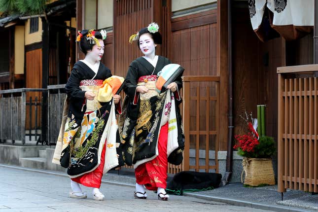 This photo was taken during an annual New Year’s ceremony in the Gion during which photography is permitted. 
