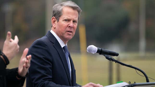 Image for article titled Georgia Gov. Brian Kemp Won't Let the Death Threats Stop Him From Ass-Kissing Donald Trump