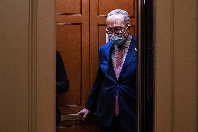 Senate Minority Leader Chuck Schumer (D-NY) heads back to his office after a press conference with Speaker of the House Nancy Pelosi (D-CA) on Capitol Hill on December 20, 2020 in Washington, DC. Republicans and Democrats in the Senate finally came to an agreement on the coronavirus relief bill and a vote is expected on Monday. 