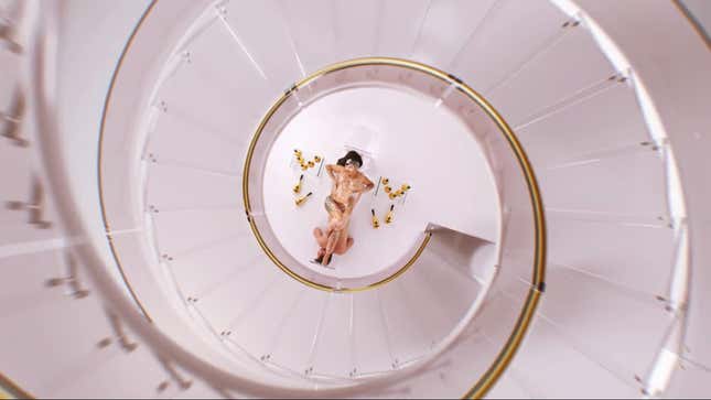 Image for article titled Cardi B Using a White Man As a Table, and Other Important Moments from the 'Up' Video