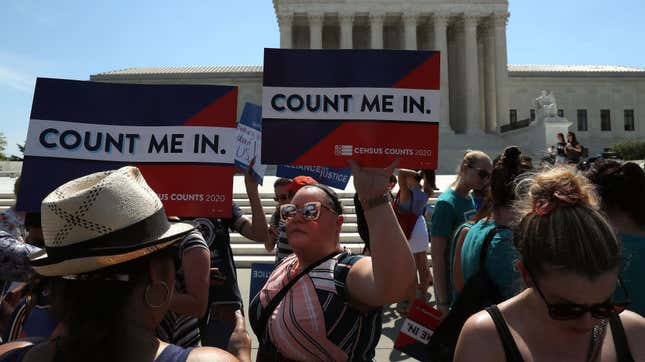 People gather in front of the U.S. Supreme Court as decisions are handed down June 27, 2019. The high court blocked a citizenship question from being added to the 2020 census. 