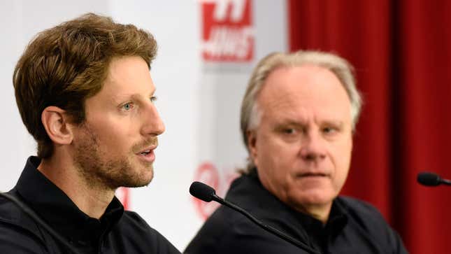 Romain Grosjean, at left, and Gene Haas during a 2015 press conference.