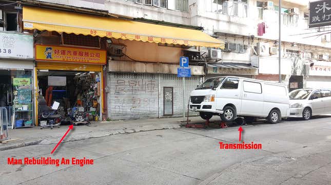 Image for article titled The Most Dedicated Mechanics In The World Wrench On The Streets Of Hong Kong