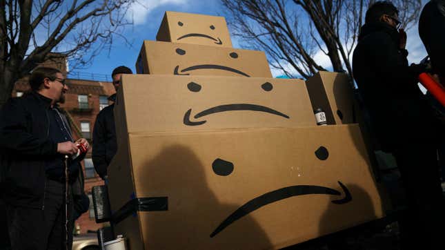 Boxes with the Amazon logo turned into a frown face are stacked up after a protest against Amazon in the Long Island City neighborhood of the Queens borough on November 14, 2018 in New York City. 