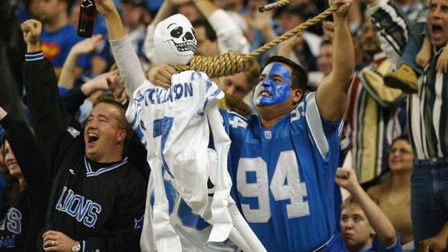 A male Detroit Lion fan enjoys using a rope noose to hang a blow up skeleton wearing a replica jersey of quarterback Chad Hutchinson #7 of the Dallas Cowboys by the neck during the game on November 3, 2002 at Ford Field in Detroit, Michigan.