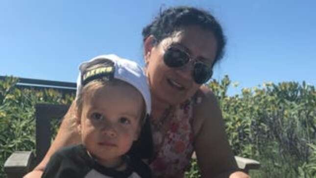 Marisol with her grandson.