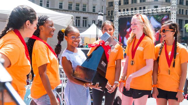 Marsai Martin (center) awards winning team Orange Flare at the 2019 ComEd Icebox Derby