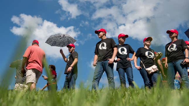 Supporters of Donald Trump wearing “QAnon” T-shirts wait in line before an October 2018 campaign rally in Tennessee. Danielle Stella, a reported supporter of the debunked far-right conspiracy theory and also a GOP candidate for Ilhan Omar’s House seat, is facing some far-out troubles of her own.