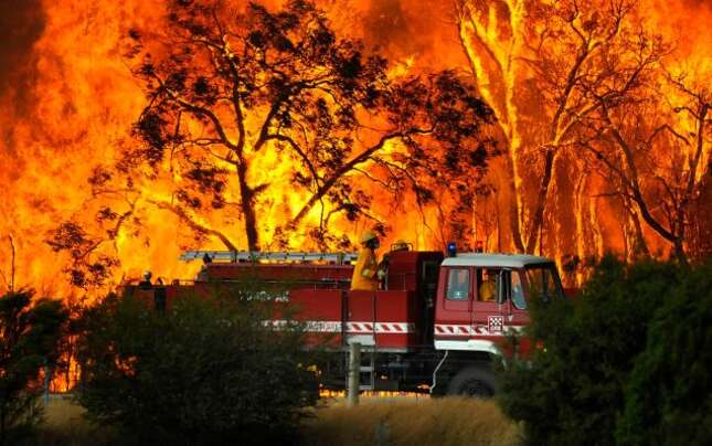 On February 7th 2009, out of control bushfires raged through Australia’s New South Wales province, claiming 173 lives in the country’s largest wildfire disaster. Image: AP