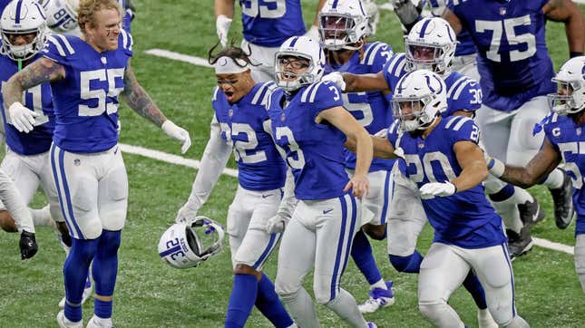 The Colts celebrate following their 34-31 win over the Packers in Week 11.