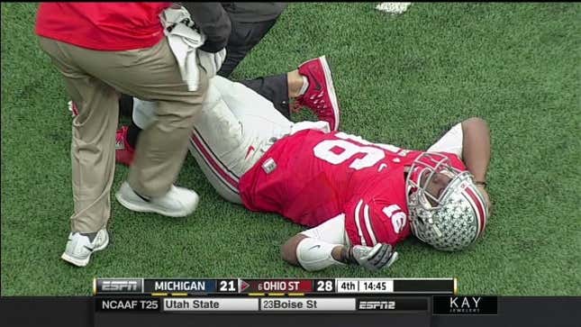 J.T. Barrett Carted Off From Michigan-OSU Game With Leg Injury