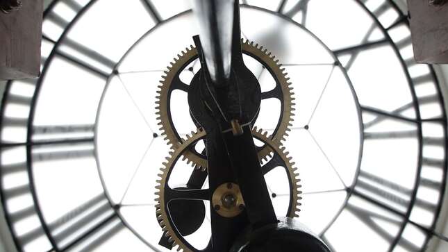 Details of the clock mechanism is seen inside the clock tower during the media preview of the Victoria Theatre and Concert Hall on July 17, 2014 in Singapore.