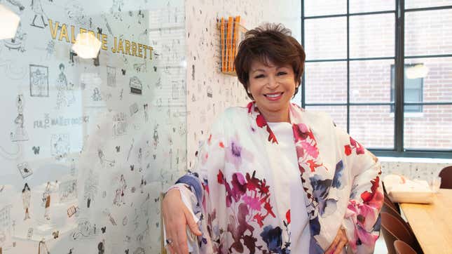 Valerie Jarrett poses in front of the conference room that bears her name at the Chicago satellite of The Wing.