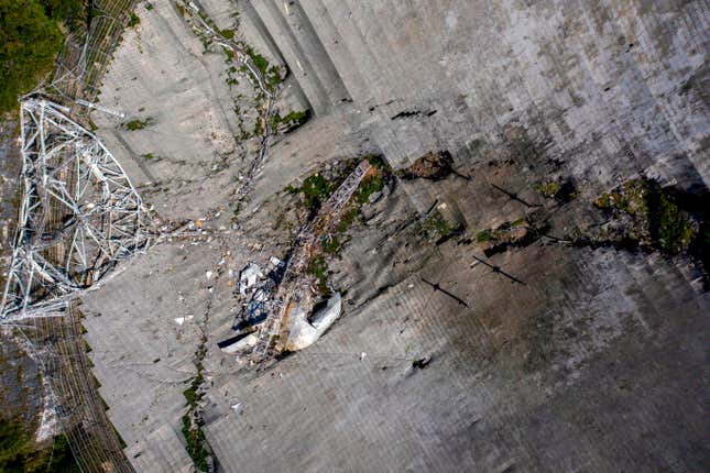Aerial view showing the fallen platform, Gregorian Dome, and support cables. 