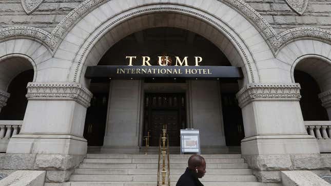 People walk past the Trump International Hotel on Pennsylvania Ave. on Oct. 25, 2019, in Washington, D.C. 