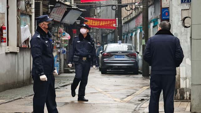 Police patrol a neighborhood on January 22, 2020 in Wuhan, China.