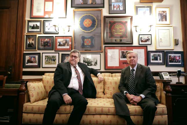 Attorney General nominee William Barr (L) poses for photographs before a meeting with Senate Judiciary Committee member Sen. Lindsey Graham (R-SC) in his office in the Russell Senate Office Building on Capitol Hill January 09, 2019 in Washington, DC.