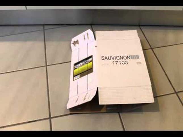 Make a Fancy Wine Bottle Display With a Cardboard Box