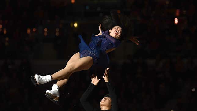 Chinese pair Sui Wenjing (Top) and Han Cong perform during the exhibition gala at the ISU Grand Prix of figure skating Final 2019 on December 8, 2019 in Turin.