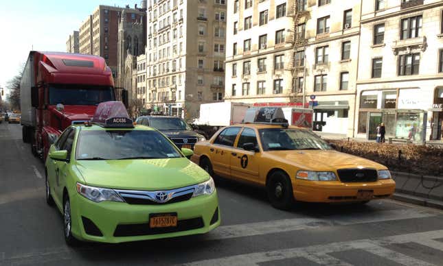 Taxicabs of New York City. Medallion taxi (yellow) on the right. Boro taxi (apple green) on the left.