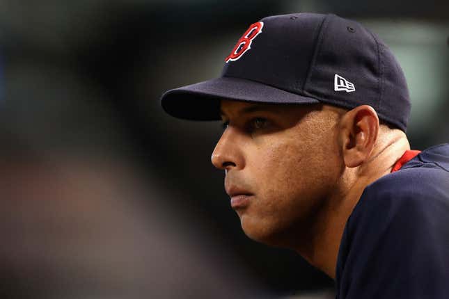 Manager Alex Cora of the Boston Red Sox watches from the dugout during the fifth inning of the MLB game against the Arizona Diamondbacks at Chase Field on April 5, 2019 in Phoenix, Arizona.