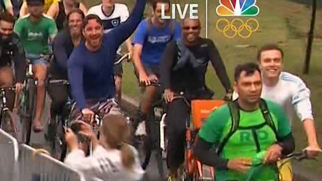 Bicycle-Riding Spectator Totally Psyched About Catching Eliud Kipchoge's Hat<em></em>