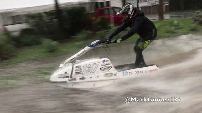Hey Wow This Guy Can Jetski On The Road In The California Rain<em></em><em></em>