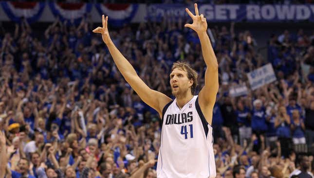 Dirk Nowitzki with the 2011 NBA Championship & MVP Trophies Game 6 of the 2011  NBA Finals Sports Photo 