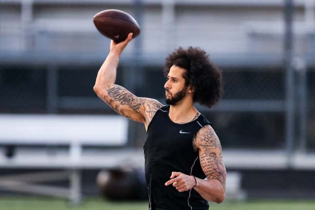 Colin Kaepernick looks to pass during his NFL workout held at Charles R Drew high school on November 16, 2019 in Riverdale, Georgia. 