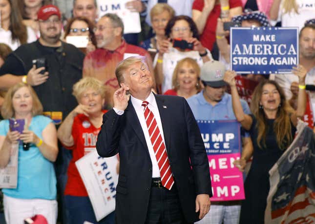 Trump gestures during a rally at the Phoenix Convention Center on August 22, 2017 in Phoenix, Arizona. 