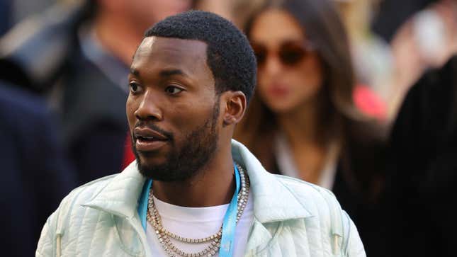 Meek Mill looks on before Super Bowl LIV at Hard Rock Stadium on February 02, 2020.