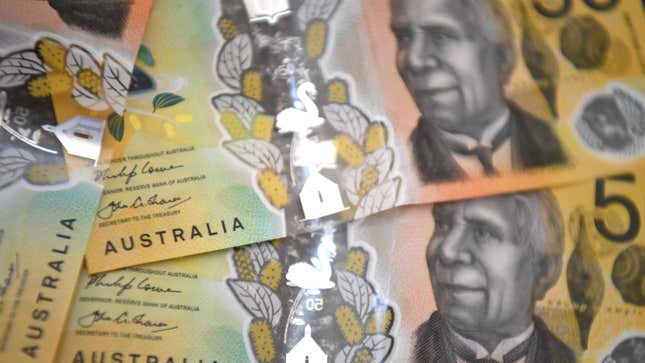 This photo illustration shows three Australian banknotes taken in Melbourne on October 12, 2020.