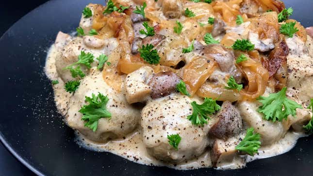 Close-up of Polish Potato Dumplings on black plate